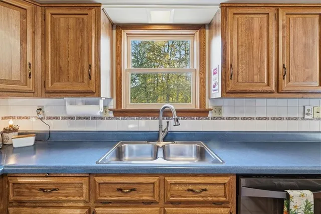 a workspace with furniture and wooden floor