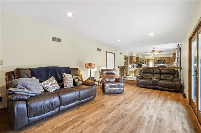 a bedroom with a bed and flat screen tv