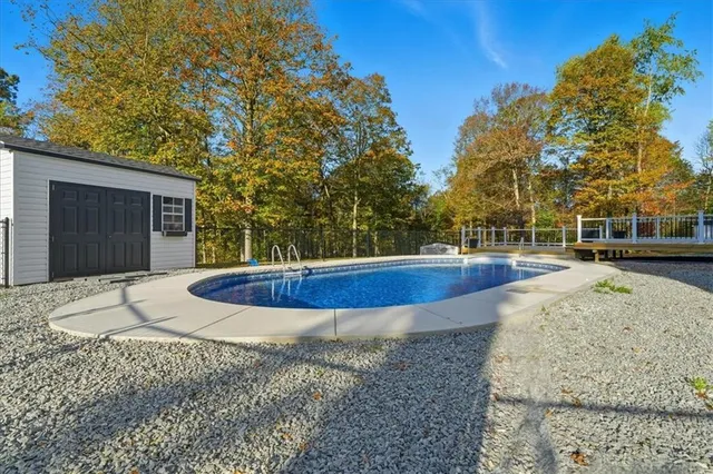 a view of a swimming pool with an outdoor space