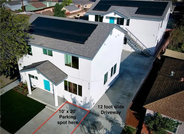 a front view of a house with a garage