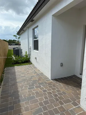 a view of backyard with garage