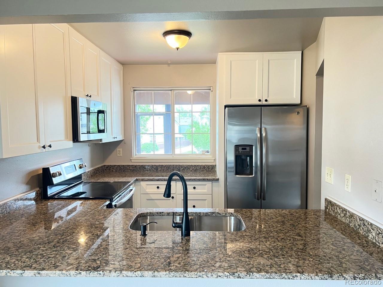 12043 Ivanhoe Circle Brighton, CO 80602 - Photo 5 of 20