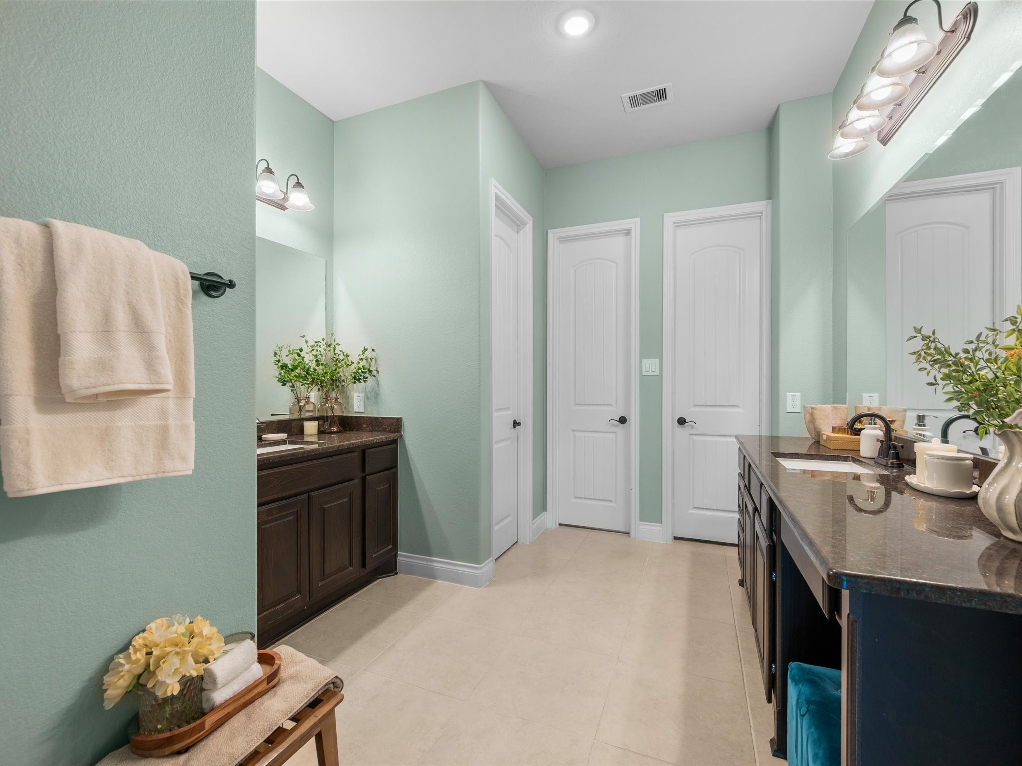 12618 Ranger Court Magnolia, TX 77354 - Photo 22 of 45 spa-like bath with dual vanities, walk-in shower, and oversizedcclosets