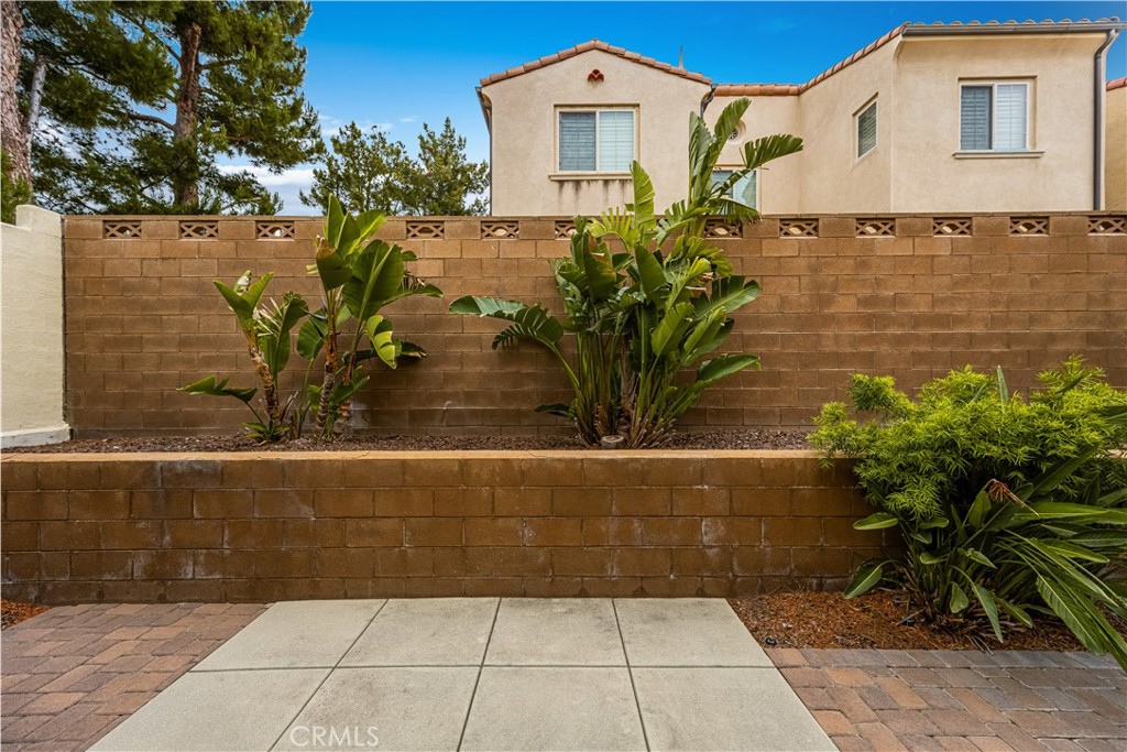 56 Pathway Irvine, CA 92618 - Photo 15 of 52 a front view of a house with a yard