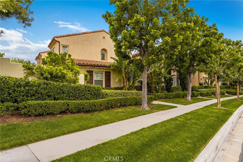 56 Pathway Irvine, CA 92618 - Photo 2 of 52 a view of a house with a big yard and potted plants