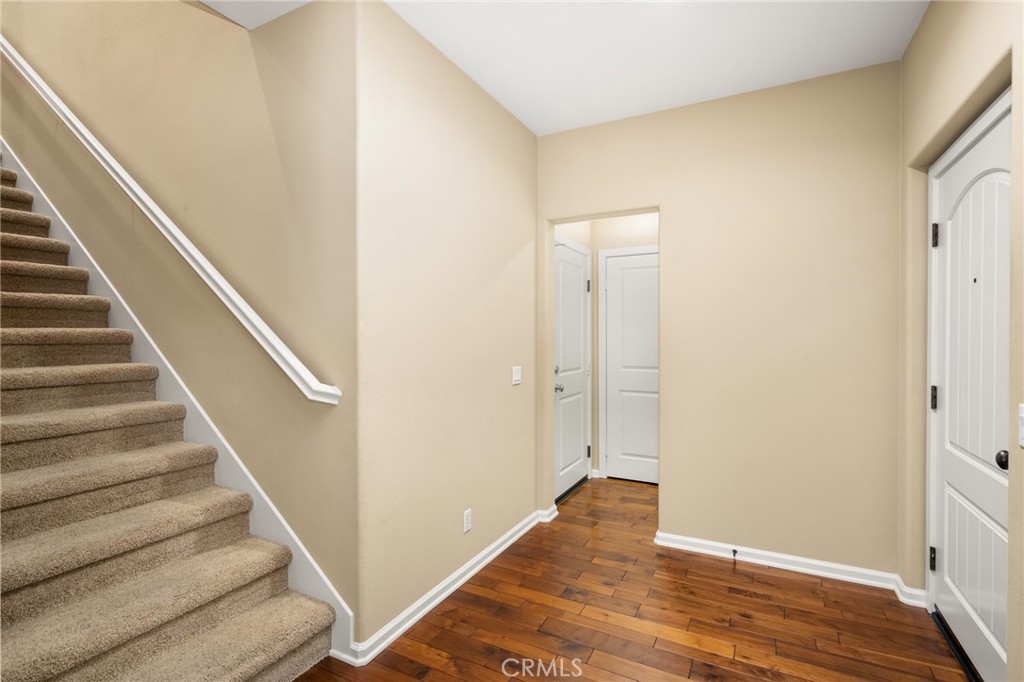 56 Pathway Irvine, CA 92618 - Photo 21 of 52 a view of an entryway with wooden floor
