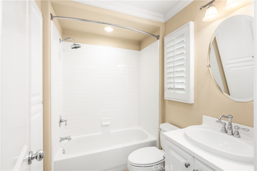 56 Pathway Irvine, CA 92618 - Photo 27 of 52 a bathroom with a bathtub shower sink vanity and a toilet