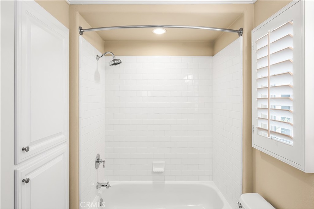 56 Pathway Irvine, CA 92618 - Photo 28 of 52 a bathroom with a shower and a bath tub