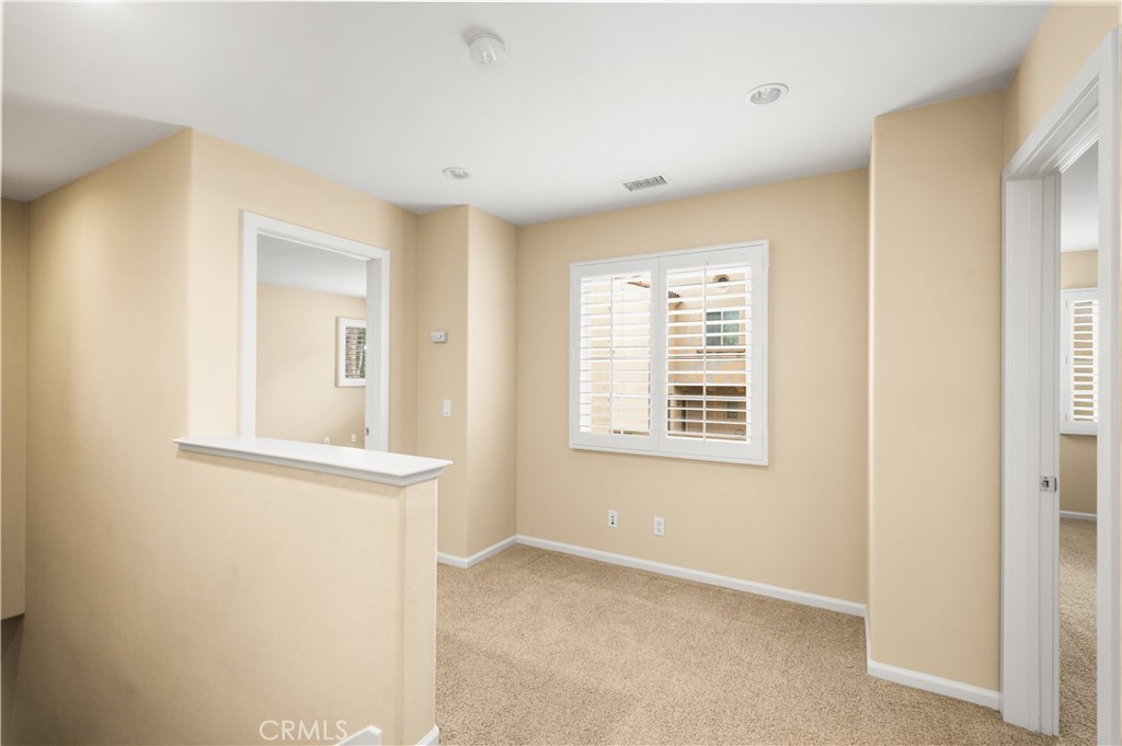 56 Pathway Irvine, CA 92618 - Photo 36 of 52 a view of an empty room with a window