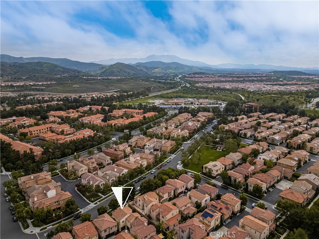 56 Pathway Irvine, CA 92618 - Photo 42 of 52 an aerial view of residential houses with outdoor space and trees