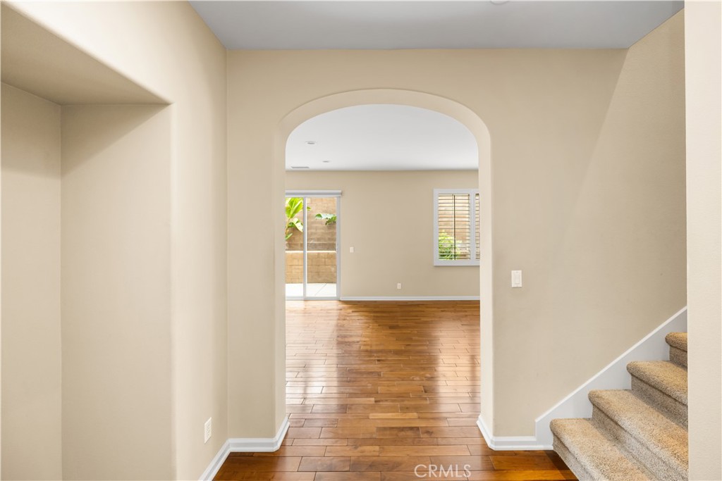 56 Pathway Irvine, CA 92618 - Photo 5 of 52 a view of empty room with wooden floor