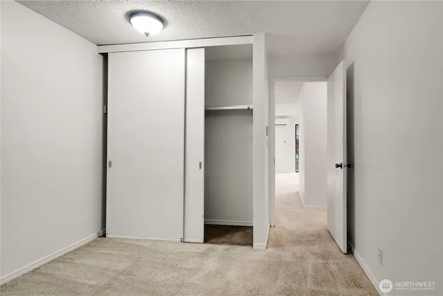 an empty room with closet