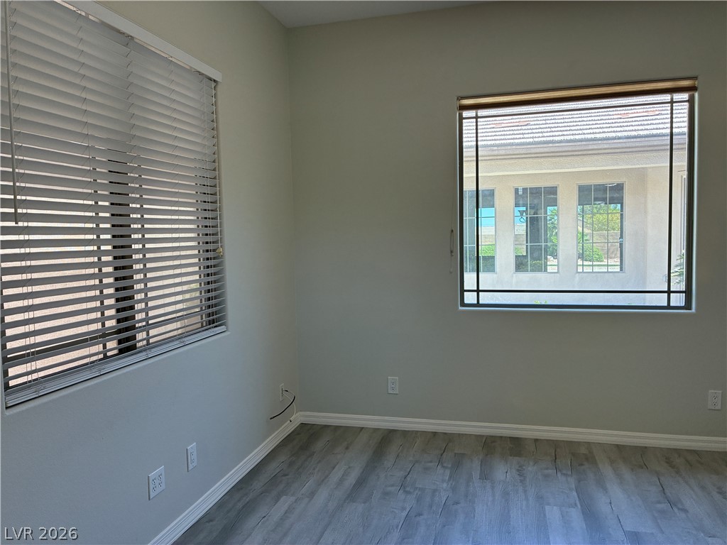 10 Caprington Road Henderson, NV 89052 - Photo 31 of 44 Hardwood-style flooring and natural illumination define this versatile interior space.