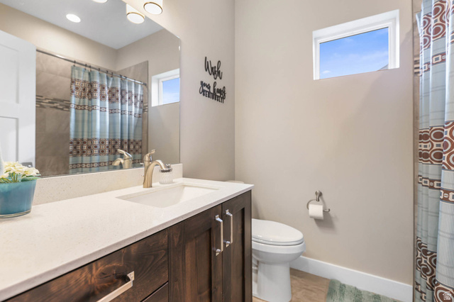 4527 North Seven Bridges Road Eden, UT 84310 - Photo 24 of 65 Bathroom with vanity and a shower with curtain
