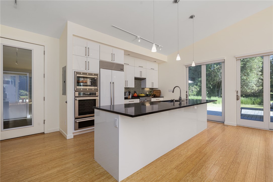 621 East Shore Road Jamestown, RI 02835 - Photo 20 of 50 This chef's kitchen has access to the breezeway, making trips from the garage simple.