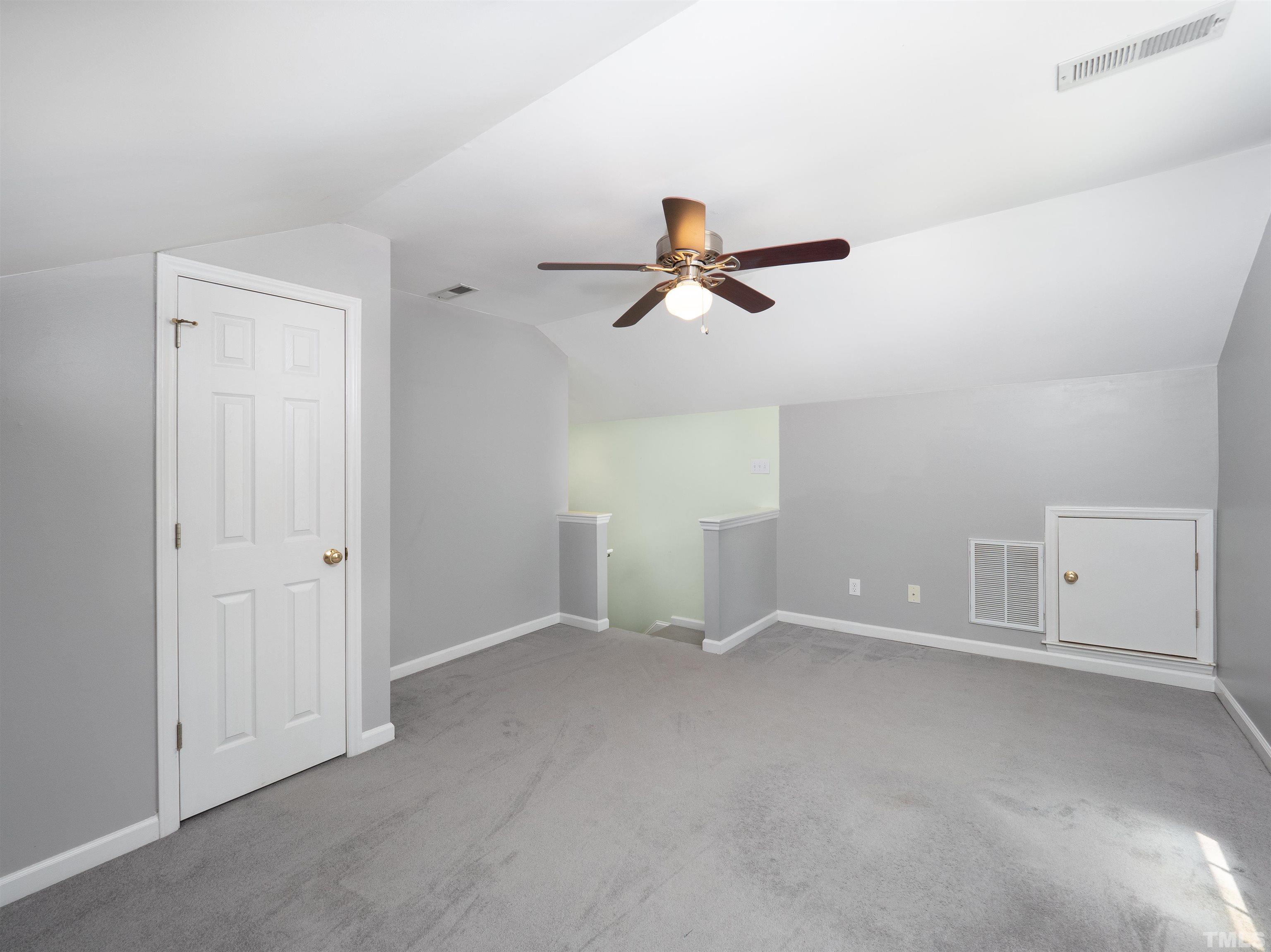 818 Shackleton Road Apex, NC 27502 - Photo 17 of 20 an empty room with ceiling fan