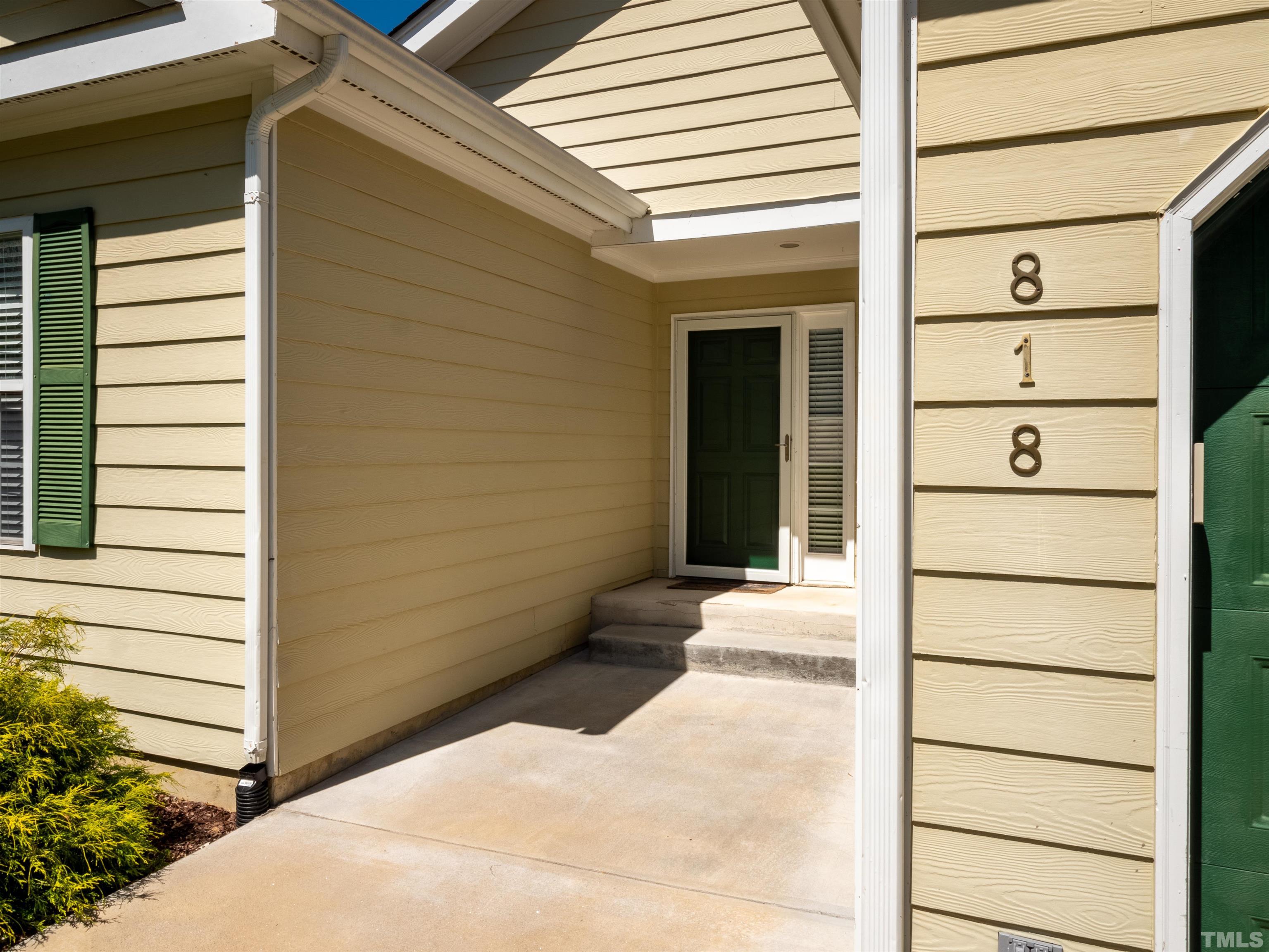 818 Shackleton Road Apex, NC 27502 - Photo 18 of 20 a view of a door back of the house