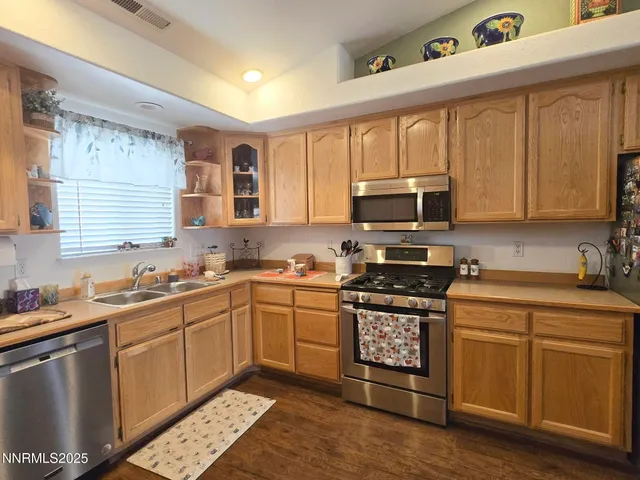 a view of a dining room with furniture and a fireplace