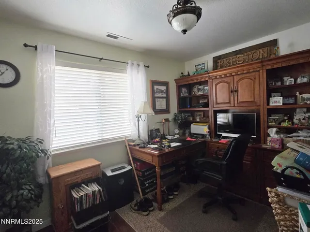 a view of a refrigerator and window