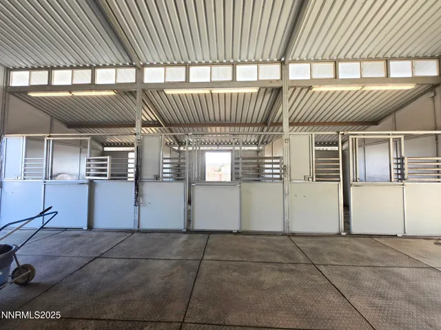a view of a backyard with sitting area