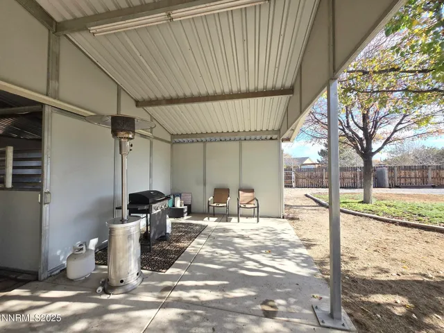 a view of large yard with a large tree