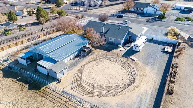 an aerial view of a house with wooden floor