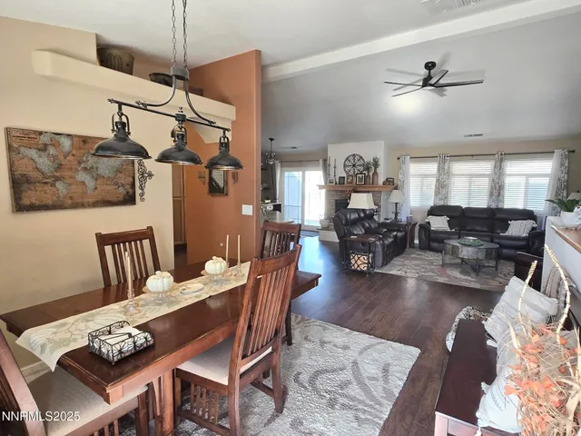 a kitchen with stainless steel appliances granite countertop a refrigerator a stove a sink and dishwasher