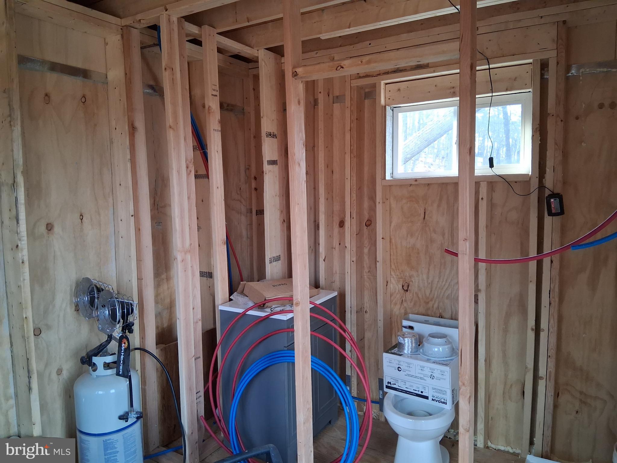 9 B Fire Tower Road Great Cacapon, WV 25422 - Photo 9 of 15 a bathroom with a toilet and a shower