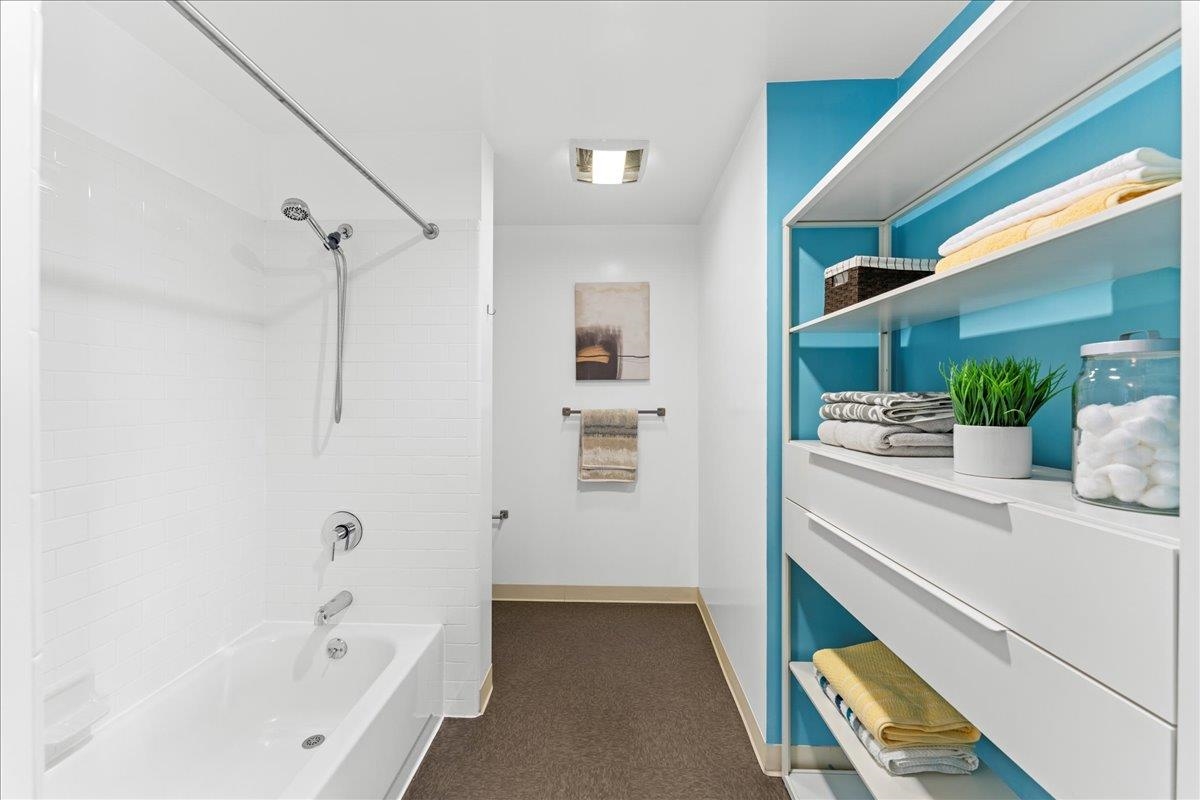 1201 Pine Street, Unit 365 Oakland, CA 94607 - Photo 17 of 33 a bathroom with a bathtub and a sink