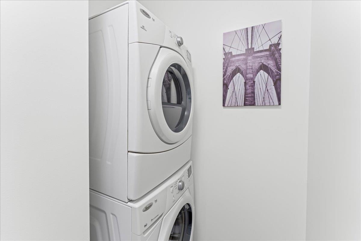 1201 Pine Street, Unit 365 Oakland, CA 94607 - Photo 22 of 33 a utility room with dryer and washer