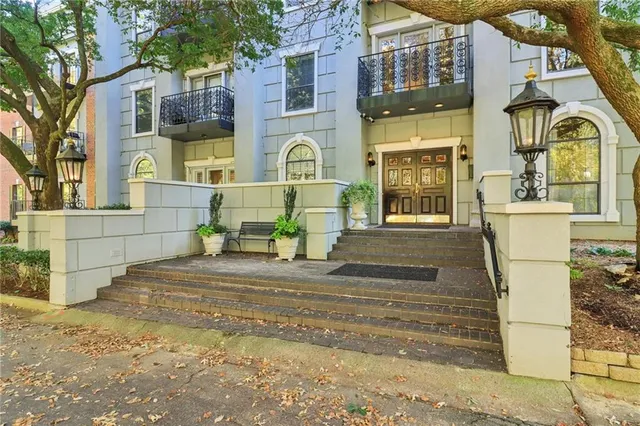a front view of a house with a outdoor space