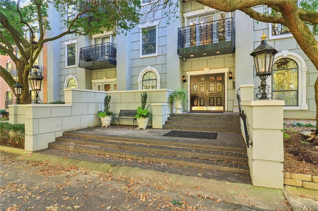 3071 Lenox Road Northeast, Unit 8 Atlanta, GA 30324 - Photo 2 of 50 a front view of a house with a outdoor space