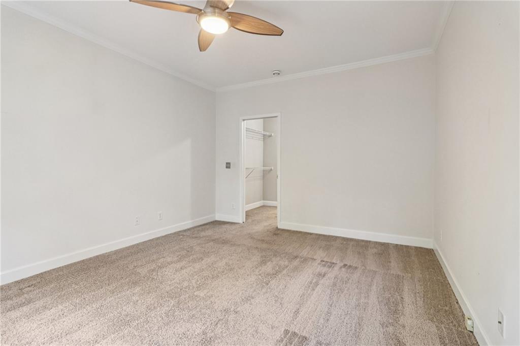 3071 Lenox Road Northeast, Unit 8 Atlanta, GA 30324 - Photo 21 of 50 an empty room with an entryway