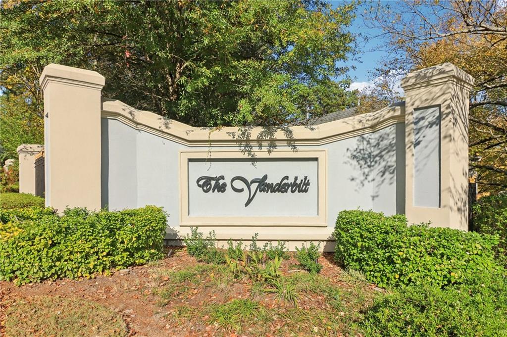 3071 Lenox Road Northeast, Unit 8 Atlanta, GA 30324 - Photo 3 of 50 a sign on the side of a building