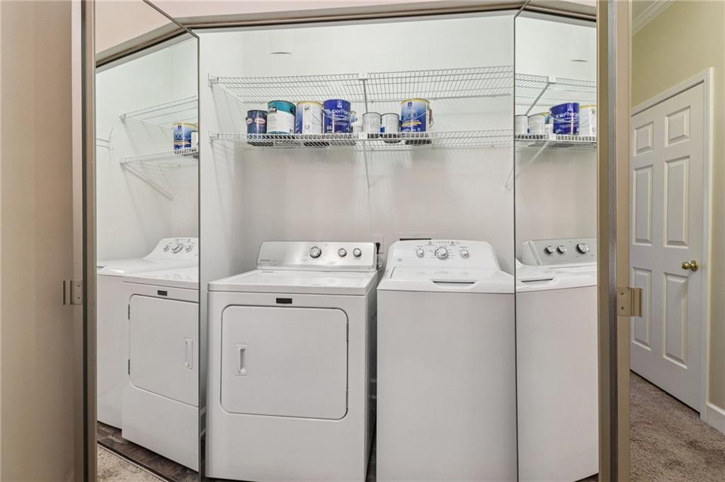 3071 Lenox Road Northeast, Unit 8 Atlanta, GA 30324 - Photo 36 of 50 a utility room with dryer and washer