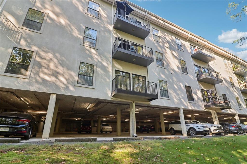 3071 Lenox Road Northeast, Unit 8 Atlanta, GA 30324 - Photo 39 of 50 a view of a building with a swimming pool