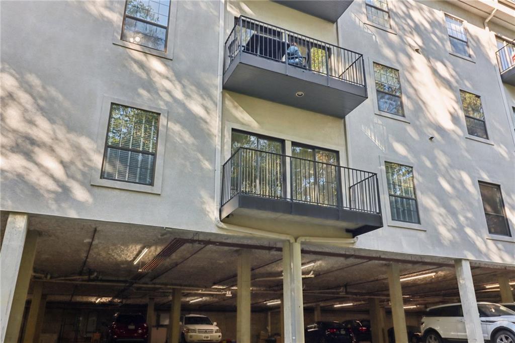 3071 Lenox Road Northeast, Unit 8 Atlanta, GA 30324 - Photo 40 of 50 a building with multiple glass windows