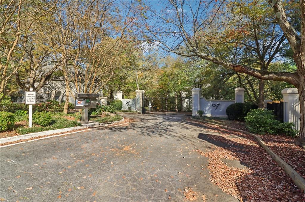 3071 Lenox Road Northeast, Unit 8 Atlanta, GA 30324 - Photo 4 of 50 a view of a road with trees