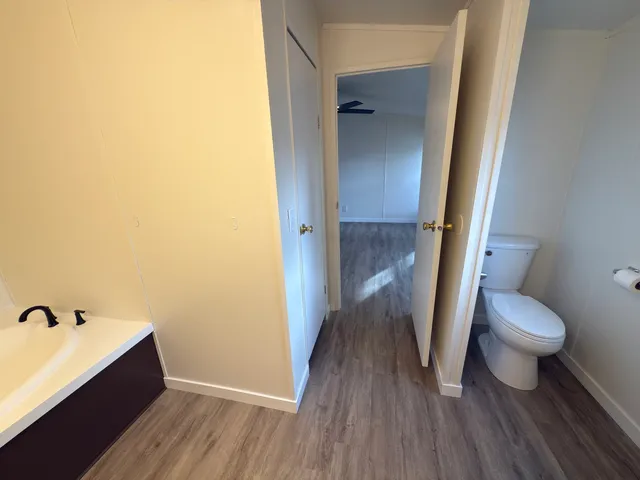 a bathroom with a sink and toilet