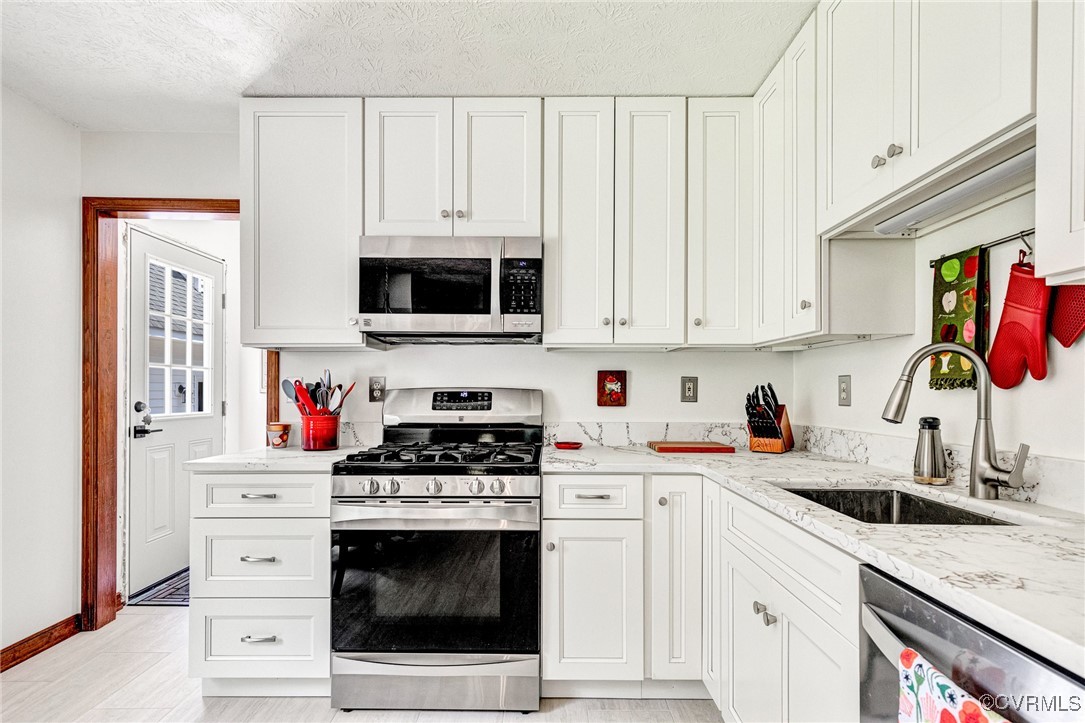 11384 Georgetown Road Mechanicsville, VA 23116 - Photo 20 of 49 Another kitchen view. Door to utility room and ex