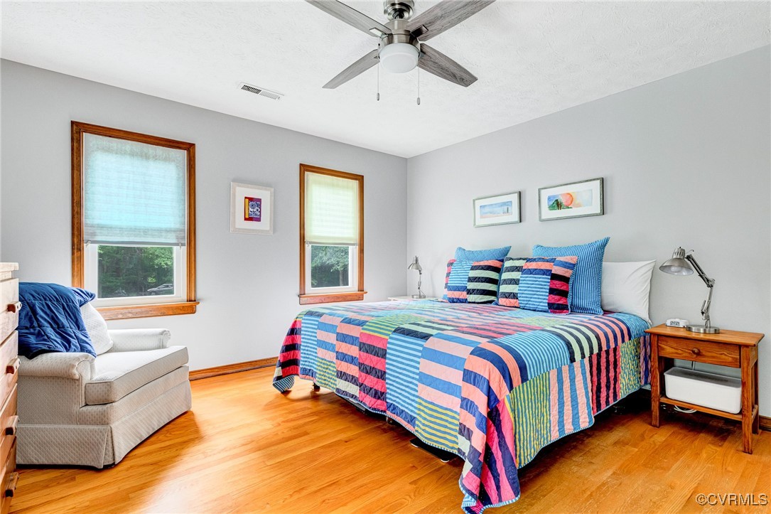 11384 Georgetown Road Mechanicsville, VA 23116 - Photo 25 of 49 Bedroom featuring wood finished floors and ceiling
