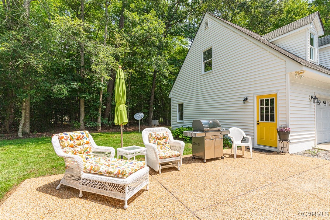 11384 Georgetown Road Mechanicsville, VA 23116 - Photo 36 of 49 Aggregate patio between house and detached garage.