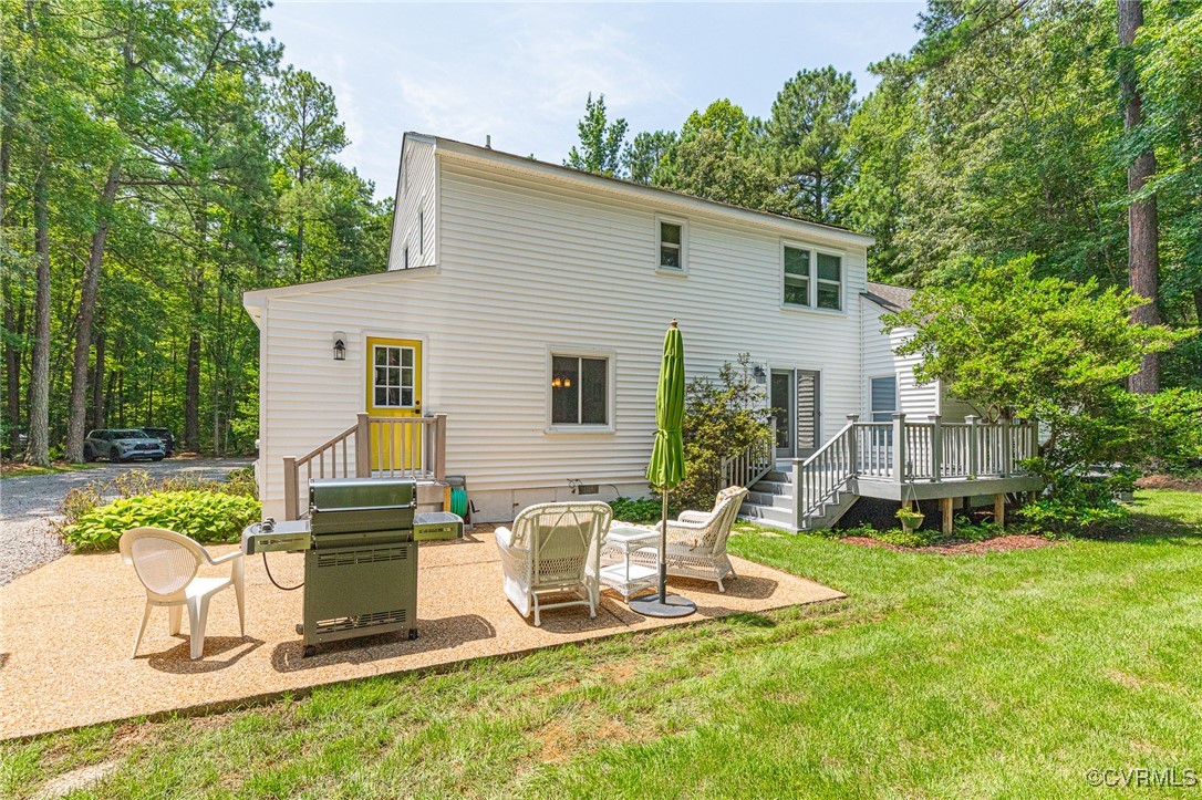 11384 Georgetown Road Mechanicsville, VA 23116 - Photo 39 of 49 Back of property with a lawn, crawl space, a deck,