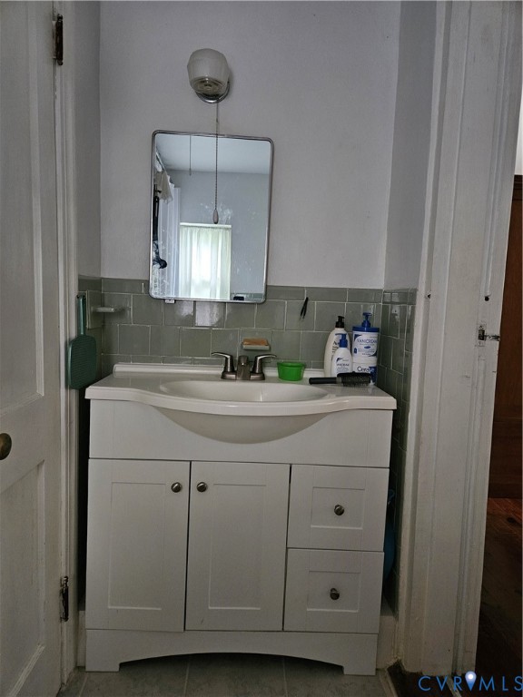 12262 Welling Hall Road Doswell, VA 23047 - Photo 15 of 42 a bathroom with a sink vanity and a mirror