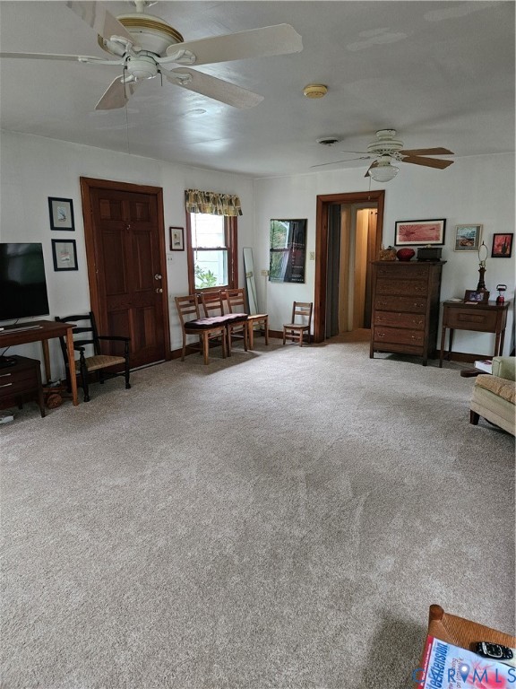 12262 Welling Hall Road Doswell, VA 23047 - Photo 20 of 42 a view of a livingroom with furniture and a flat screen tv