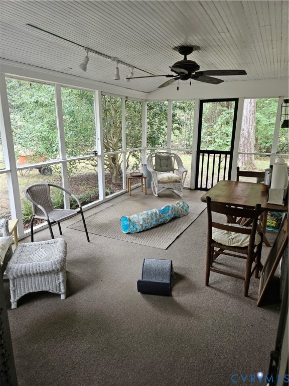12262 Welling Hall Road Doswell, VA 23047 - Photo 27 of 42 a living room with furniture and a large window