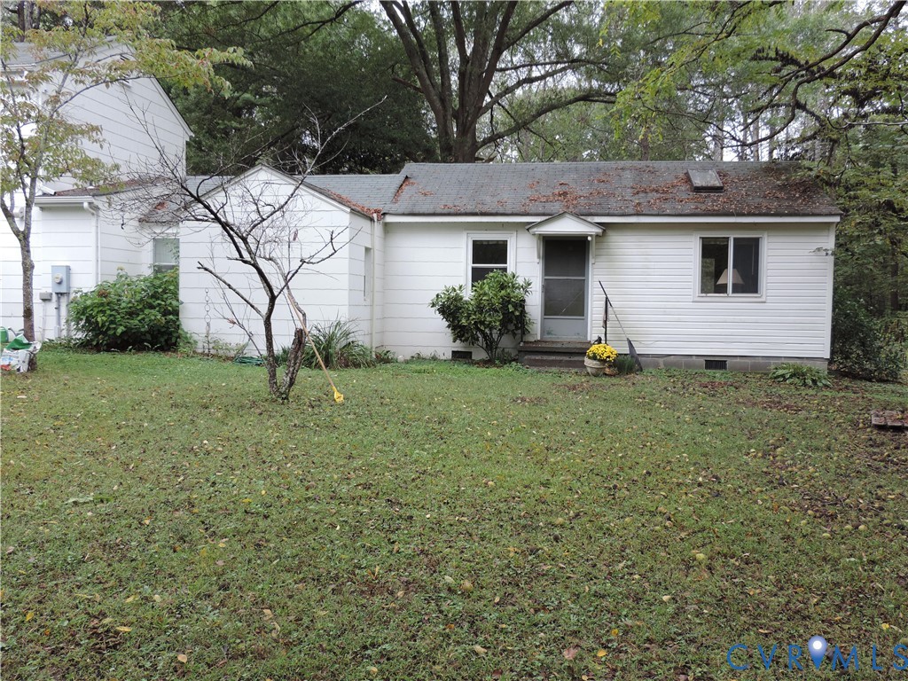 12262 Welling Hall Road Doswell, VA 23047 - Photo 33 of 42 a view of a house with yard and a tree