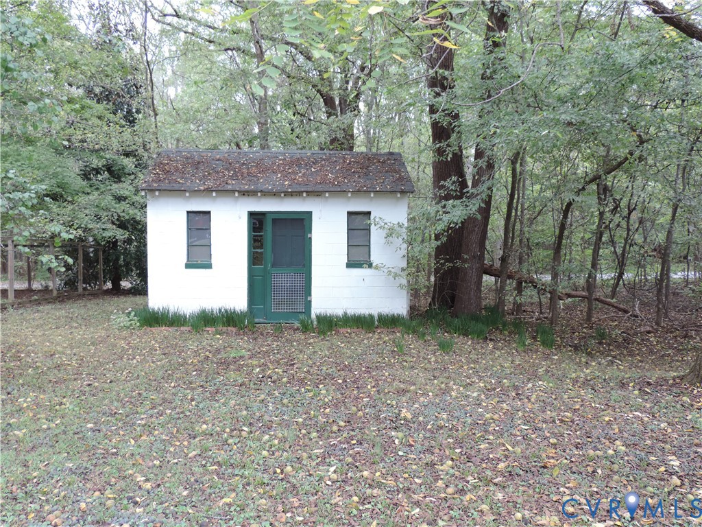 12262 Welling Hall Road Doswell, VA 23047 - Photo 36 of 42 a house view with a outdoor space