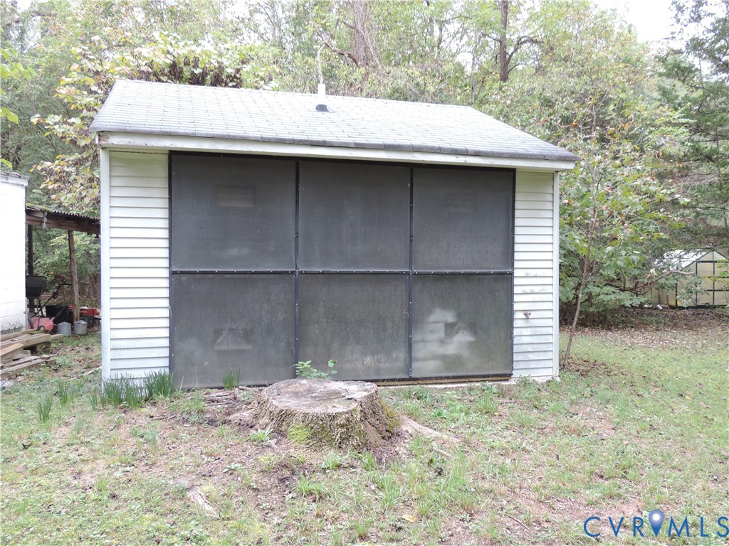 12262 Welling Hall Road Doswell, VA 23047 - Photo 40 of 42 a backyard of a house