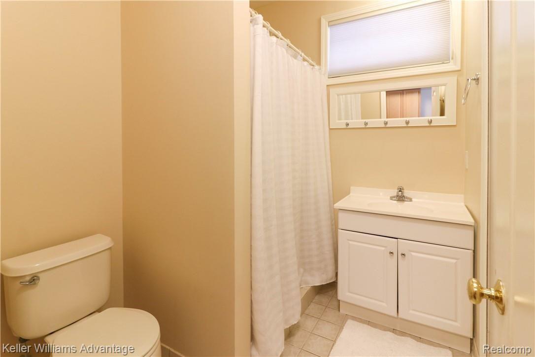 8932 Cooley Lake Road White Lake, MI 48386 - Photo 29 of 36 Lower Level also features a full bath with shower!